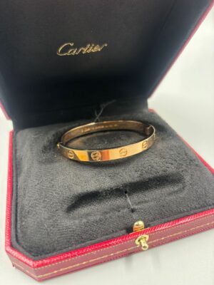 Pulsera love de Cartier  Rosada